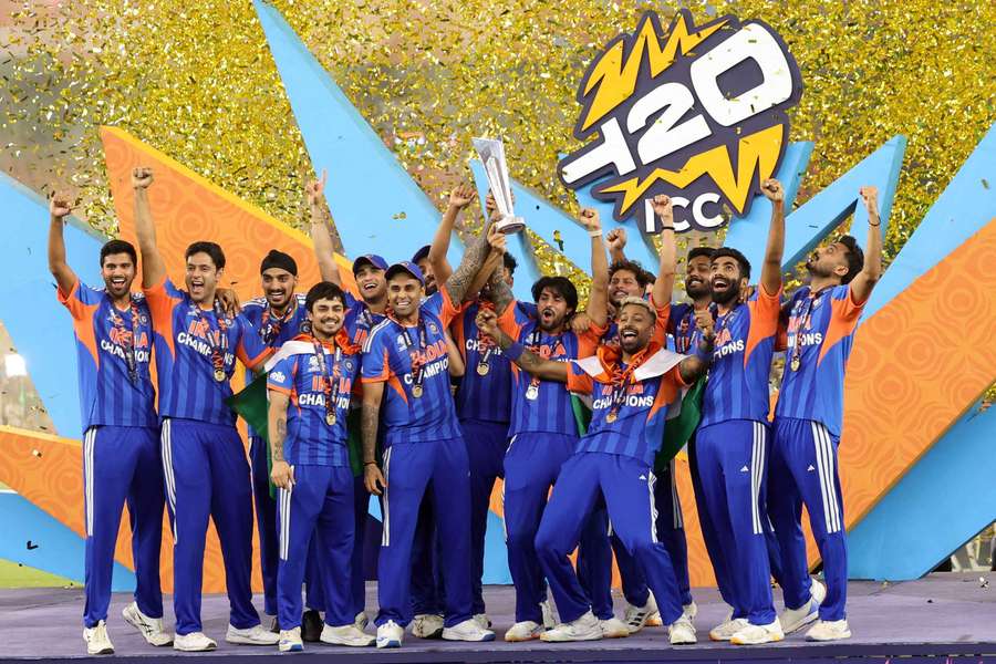 India's Suryakumar Yadav lifts the trophy as he celebrates with teammates after winning the ICC Men's T20 World Cup India's Suryakumar Yadav lifts the trophy as he celebrates with teammates after winning the ICC Men's T20 World Cup