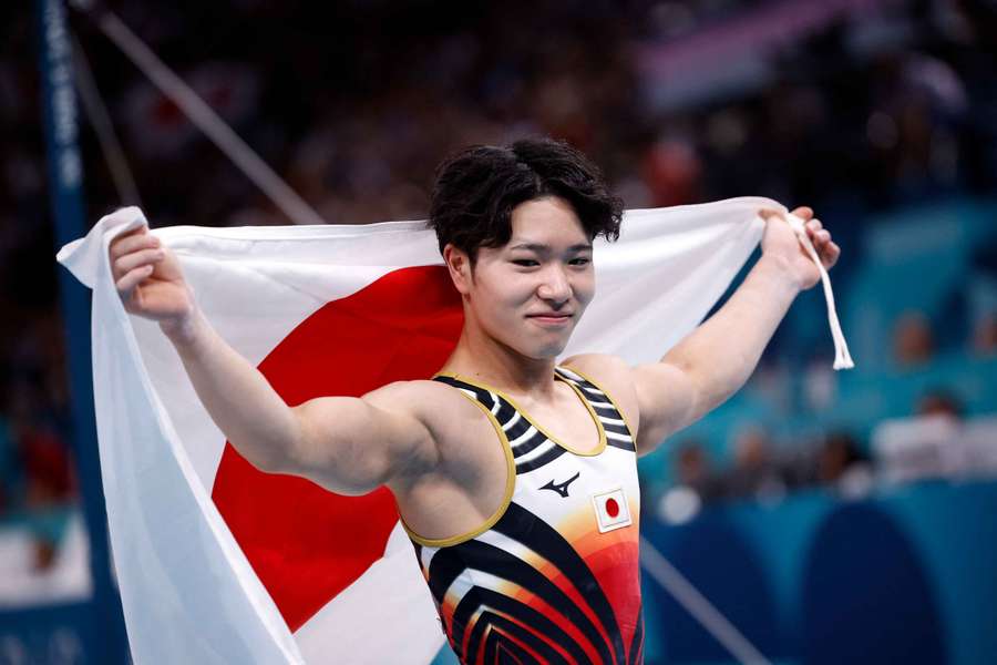 Shinnosuke Oka celebrates after winning the final