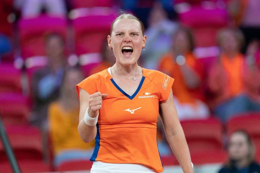 The Netherlands' Suzan Lamens celebrates winning a point during the match against Tatjana Mari
