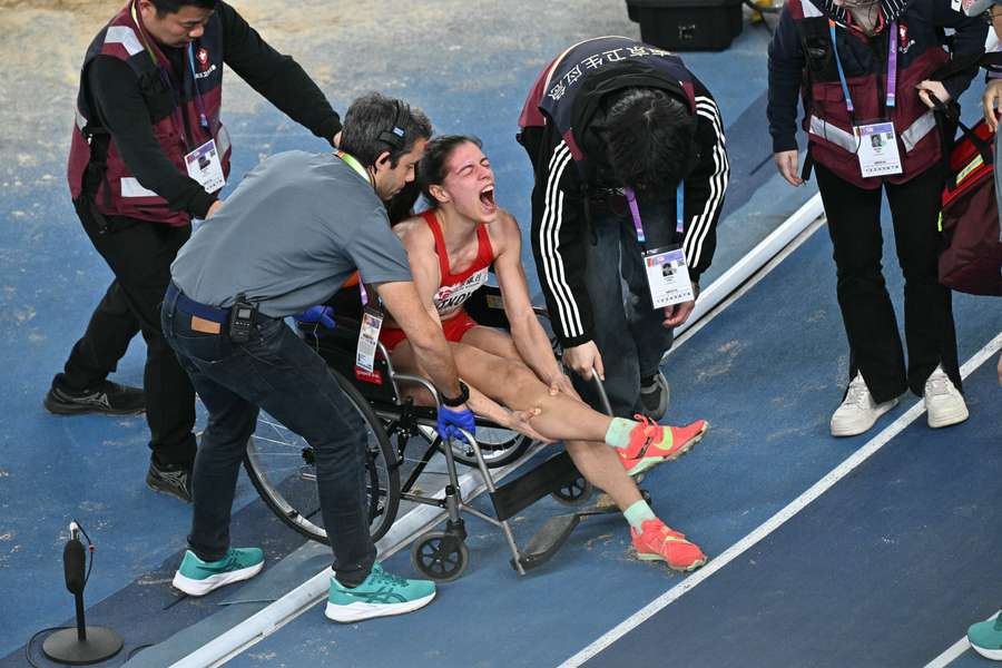 Plamena Mitkova was taken away by medics during the long jump final