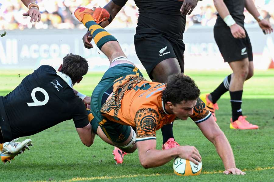 Australia's Jeremy Williams scoring a try against New Zealand in Sydney. Australia's Jeremy Williams scoring a try against New Zealand in Sydney.