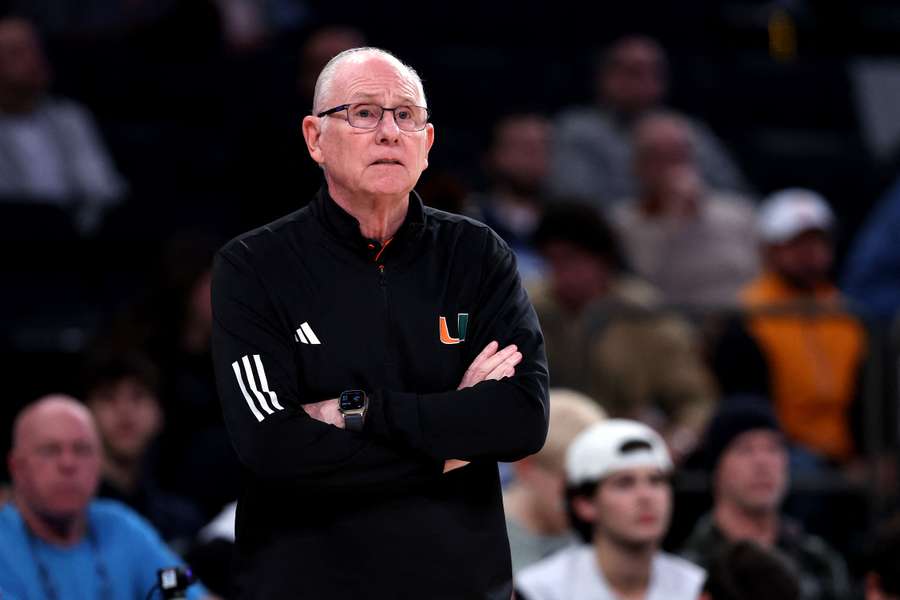 Former Miami head coach Jim Larranaga standing on the sideline during a game