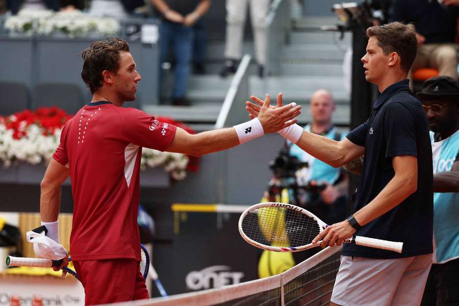 Alexander Blockx (right) shakes hands with Casper Ruud after winning their quarter-final match