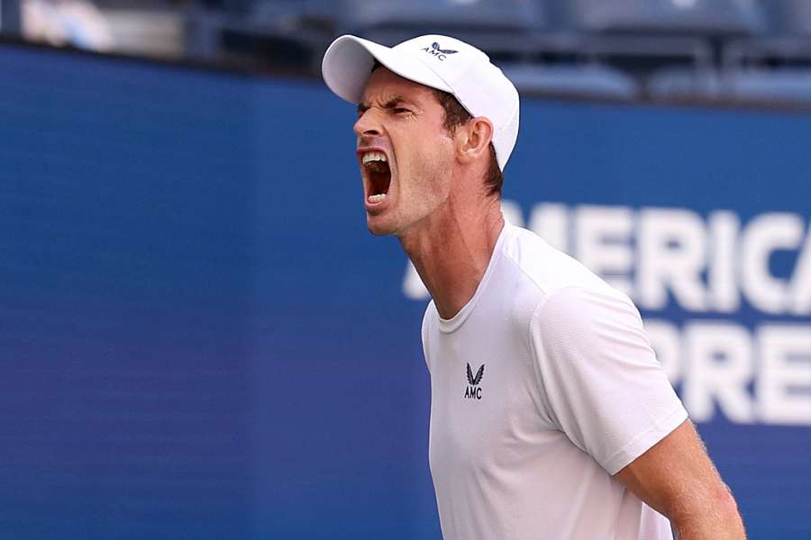 Andy Murray reacts during his second-round defeat to Grigor Dimitrov at the US Open