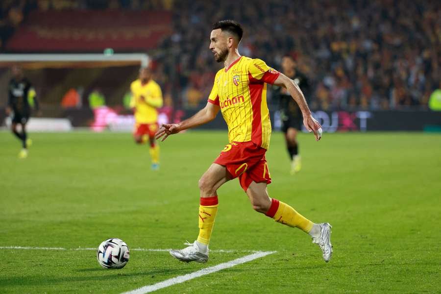Adrien Thomasson avec Lens. Adrien Thomasson avec Lens.