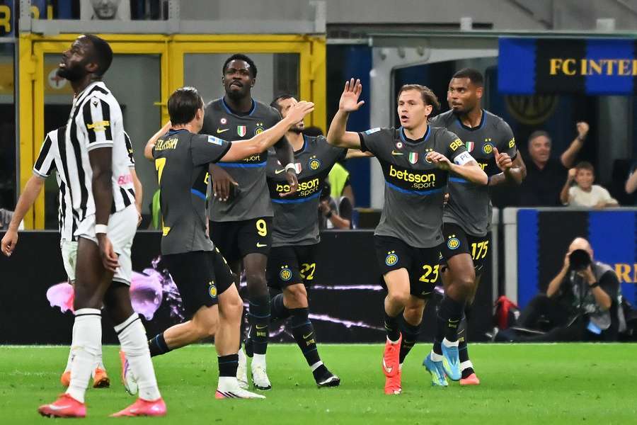 Inter players celebrate a goal against Udinese Inter players celebrate a goal against Udinese