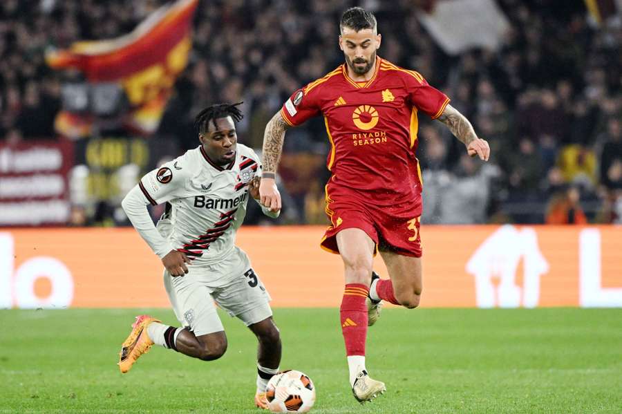 Leonardo Spinazzola, right, in action for Roma