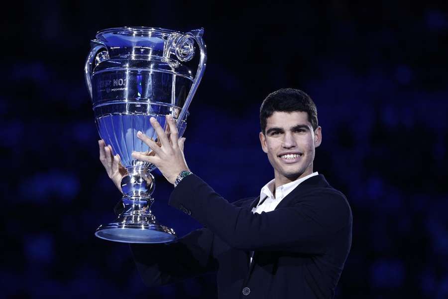 Carlos Alcaraz presented with the trophy for world number one