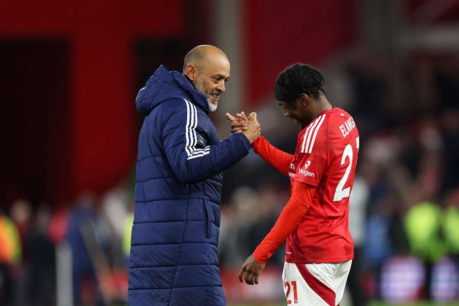 Nuno Espirito Santo celebrates with Anthony Elanga following Nottingham Forest's victory over Manchester United.