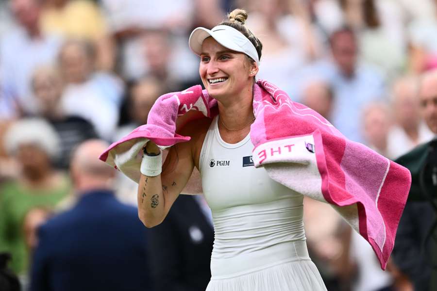 Marketa Vondrousova celebrates winning against Ons Jabeur