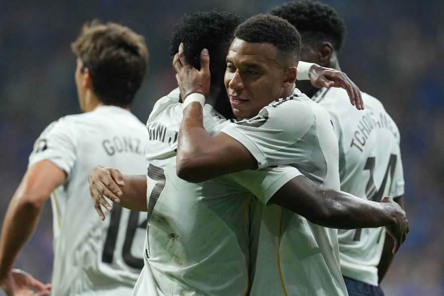 Real Madrid's Kylian Mbappe celebrates with teammates after scoring his side's second goal against Real Oviedo Real Madrid's Kylian Mbappe celebrates with teammates after scoring his side's second goal against Real Oviedo