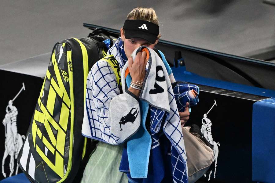 Wozniacki leaves the court after her loss