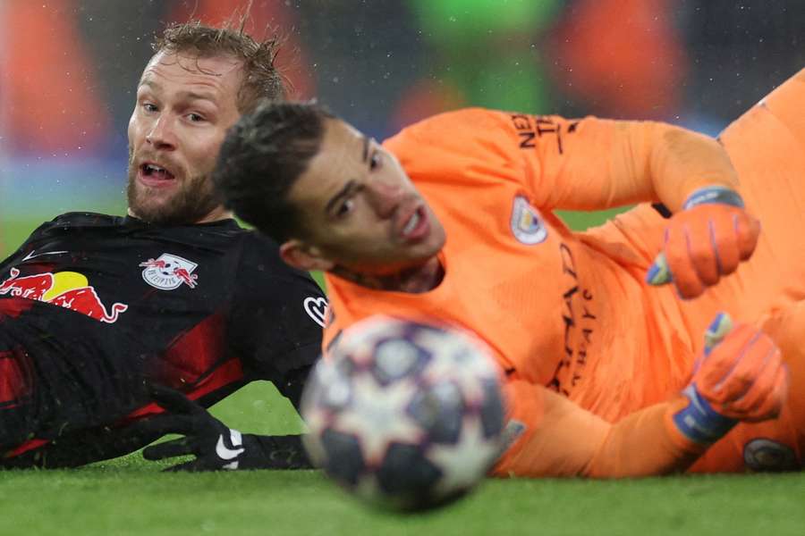 RB Leipzig were unable to test Ederson, right, for much of the night in their heavy loss to Manchester City