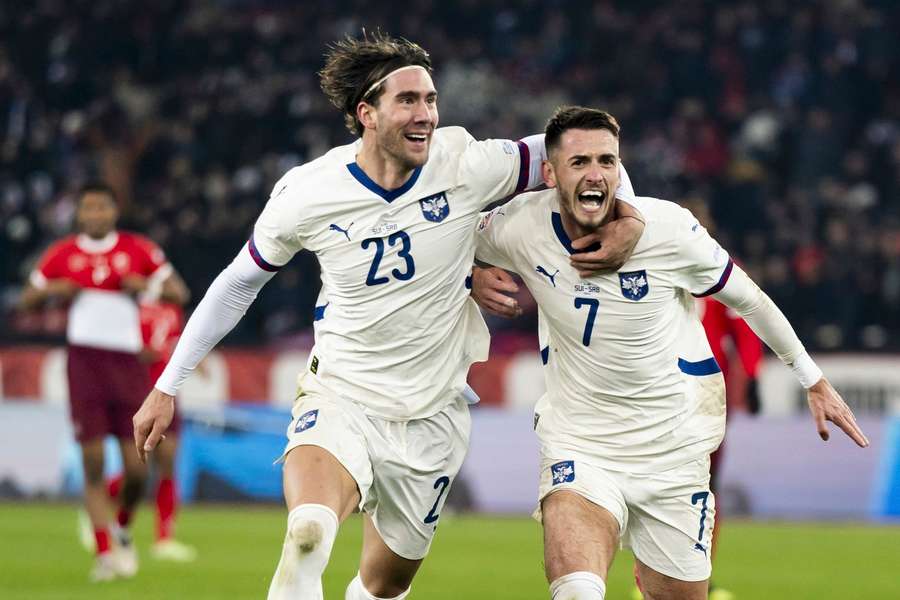 Serbia's Aleksa Terzic, right, celebrates scoring with teammate Dusan Vlahovic