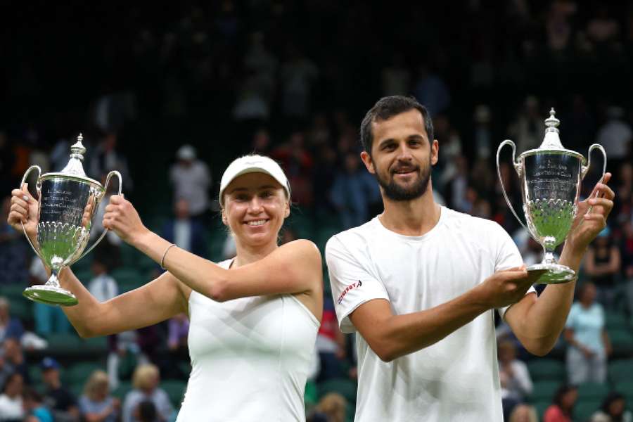 Kichenok and Pavic with their trophies