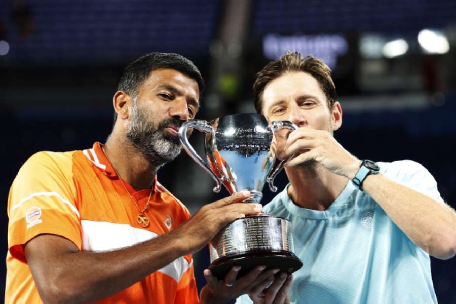 Bopanna and Ebden with their trophy