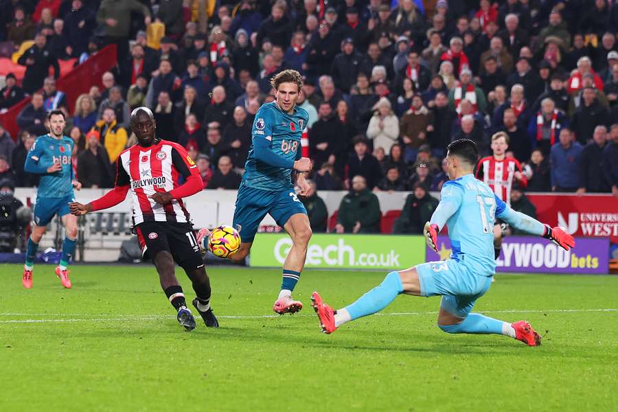 Yoane Wissa fires past Bournemouth goalkeeper Kepa Arrizabalaga to score Brentford's third goal