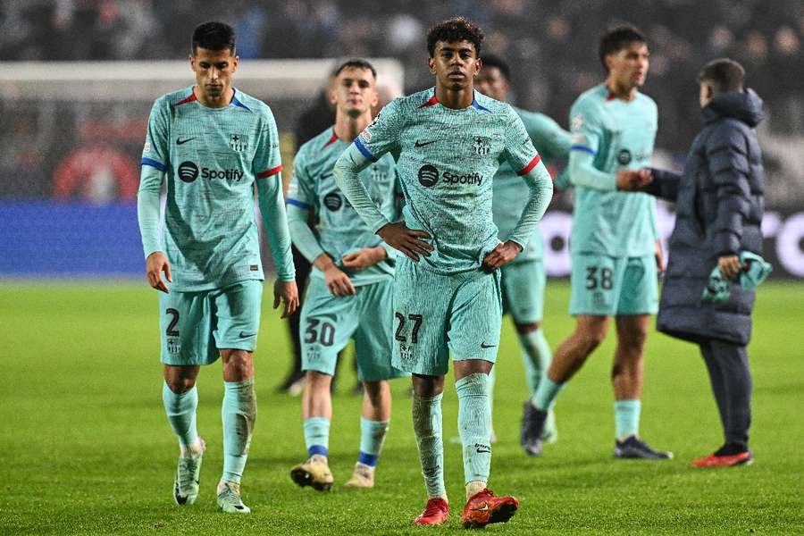 A disconsolate Barcelona side leave the pitch after Wednesday's Champions League defeat to Antwerp cranked up the criticism