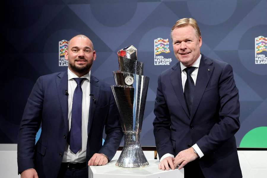 Netherlands coach Ronald Koeman with former player Wesley Sneijder during the draw 