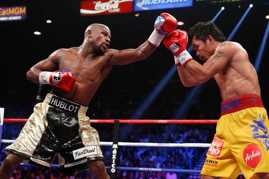 Mayweather proti Pacquiaovi v prvom zápase. Mayweather proti Pacquiaovi v prvom zápase.