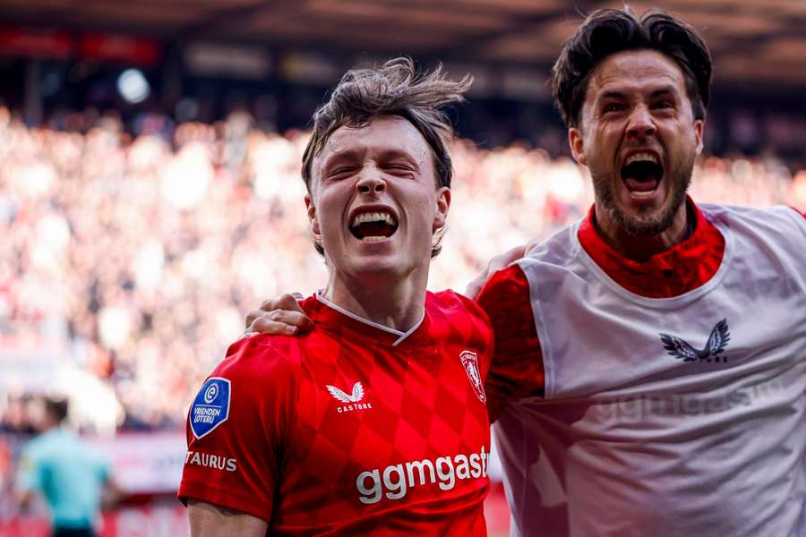 FC Twente's Sondre Orjasaeter (L) celebrates scoring the 2-0 with Ricky van Wolfswinkel
