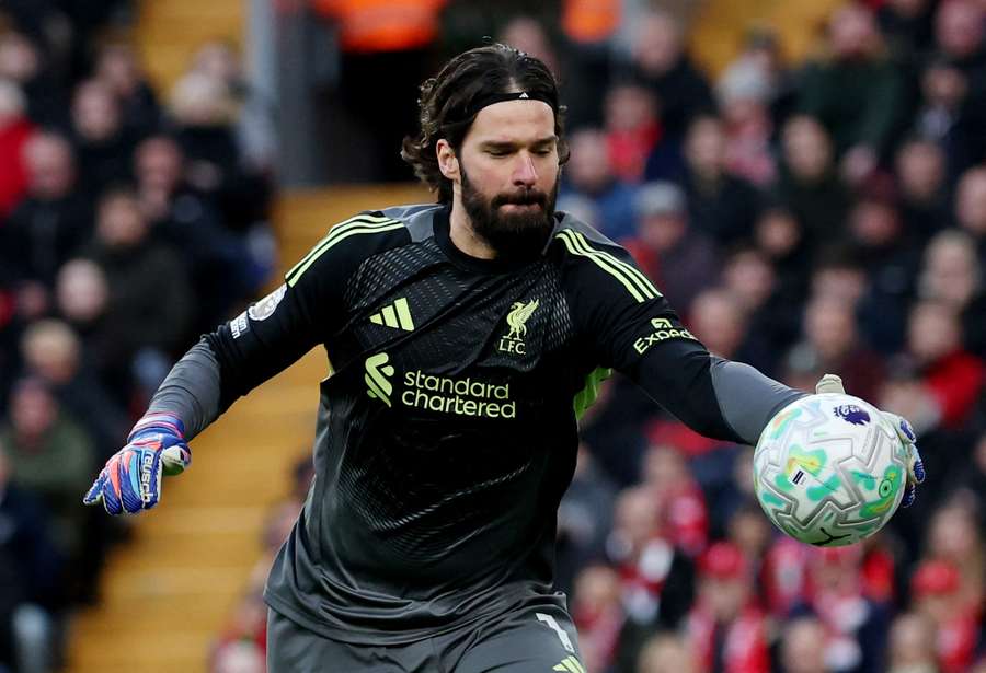 Liverpool's Alisson in action