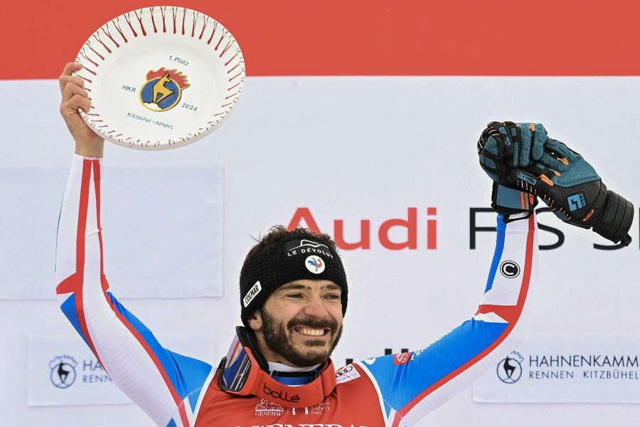 Winner Cyprien Sarrazin of France celebrates during the victory ceremony