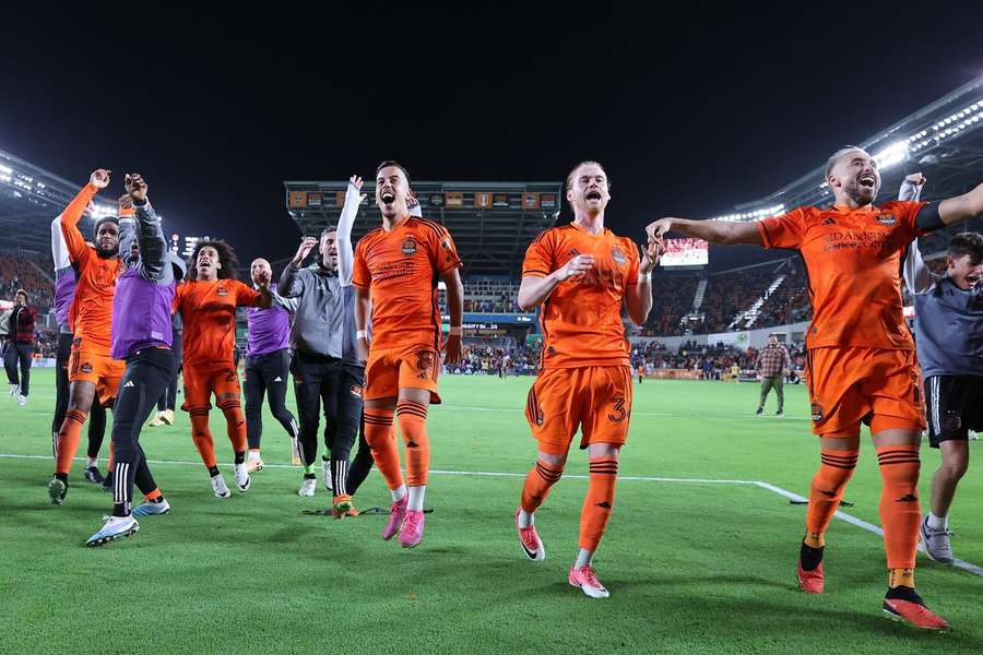 Dynamo's players celebrate their win