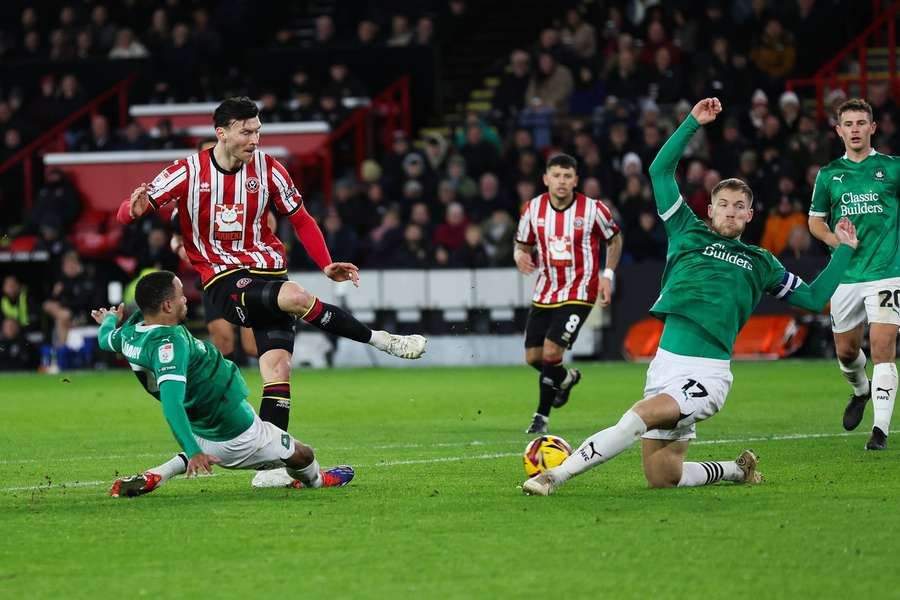 Kieffer Moore of Sheffield United shoots on goal 