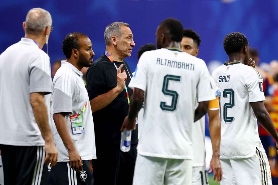 Saudi Arabia coach Georgios Donis talks to his players Saudi Arabia coach Georgios Donis talks to his players