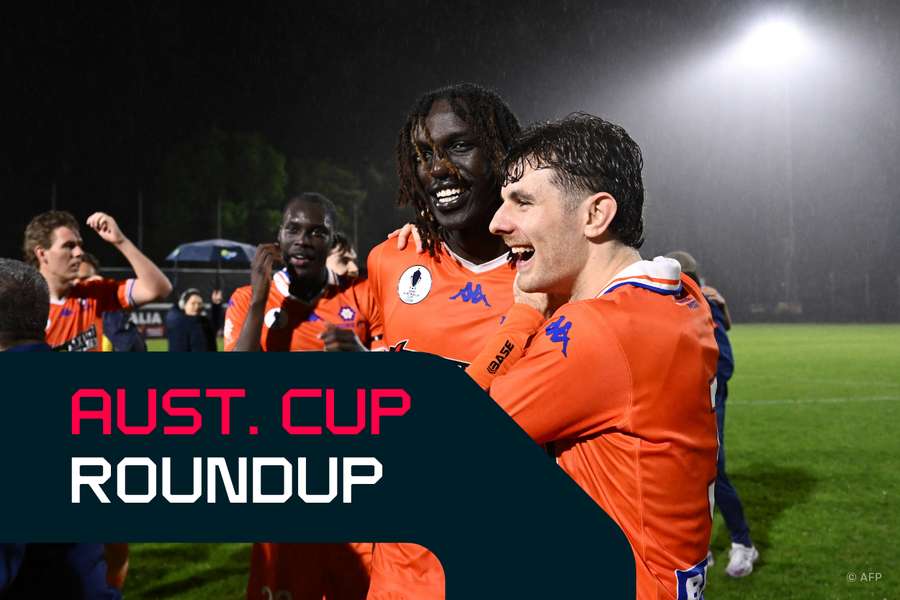 Cher Deng and Jackson Hart-Phillips celebrate Lions FC's progression to the Round of 16.