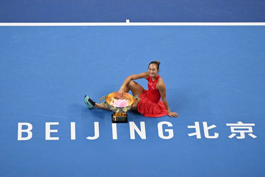 Zheng Qinwen posing gleefully with the China Open trophy on Sunday night. Zheng Qinwen posing gleefully with the China Open trophy on Sunday night.