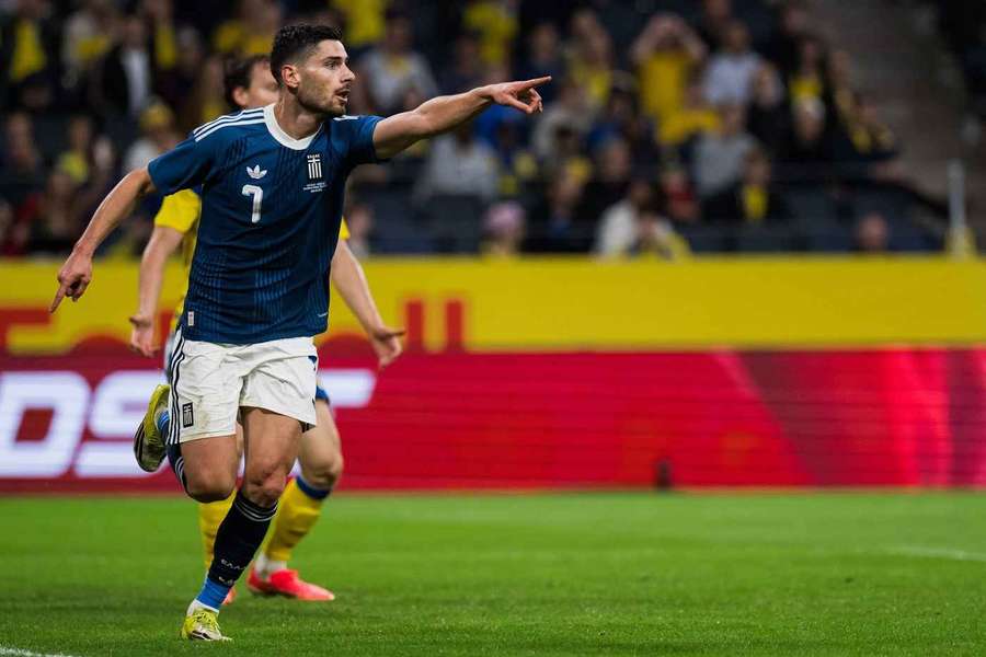 Georgios Masouras wheels away in celebration after scoring