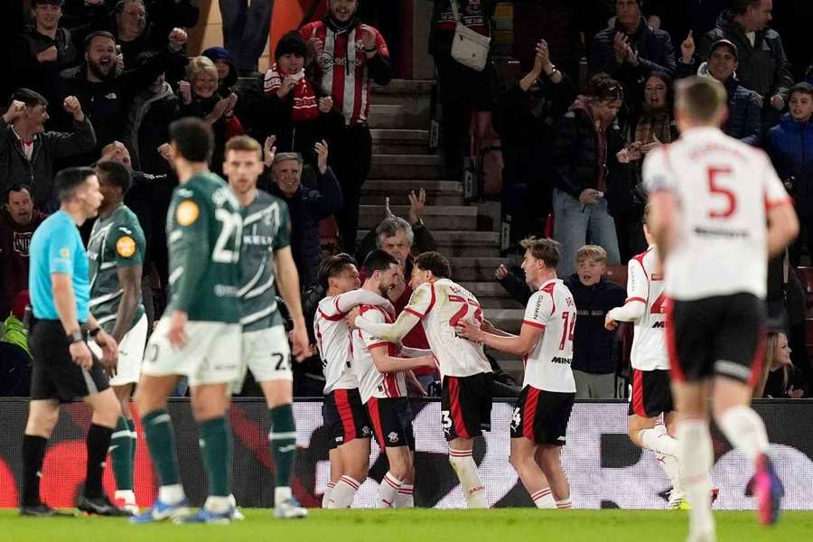 Southampton's Finn Azaz (rear centre) celebrates with his teammates after scoring 