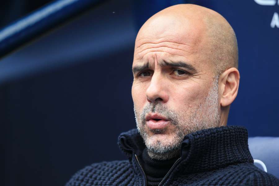 Manchester City's Spanish manager Pep Guardiola reacts during the English Premier League football match between Manchester City and Leeds