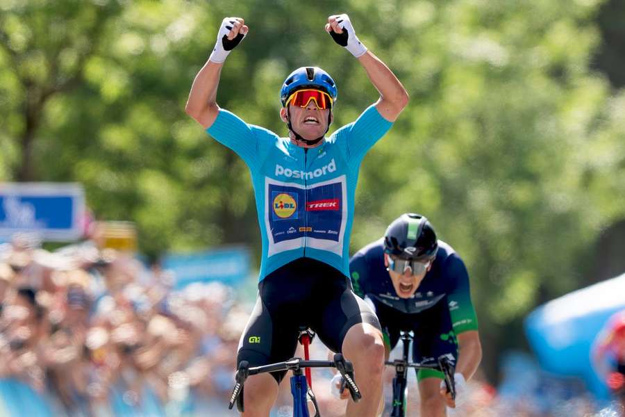 Mads Pedersen celebrates his overall win