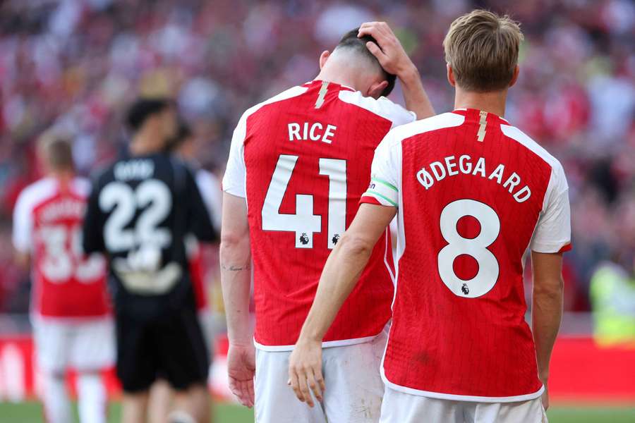 Arsenal will be without Martin Odegaard (right) and Declan Rice for the trip to Tottenham