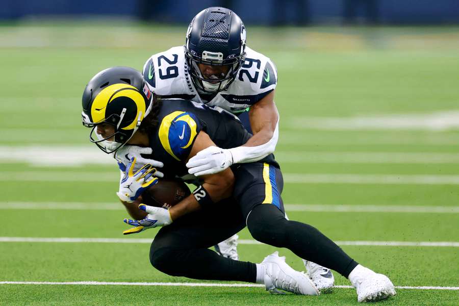 Rams receiver Puka Nacua tackled by Seahawks defender Josh Jobe (2025)