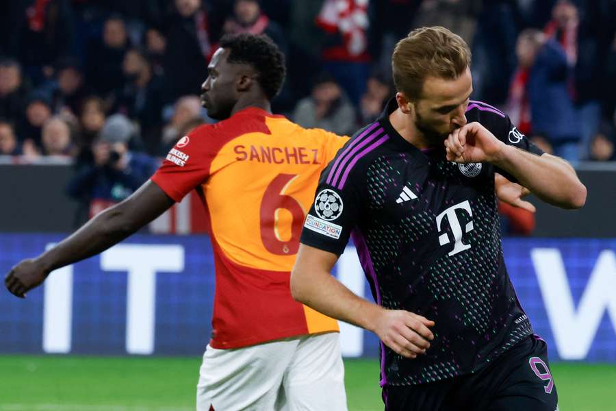 Harry Kane celebrates after putting Bayern 2-0 up