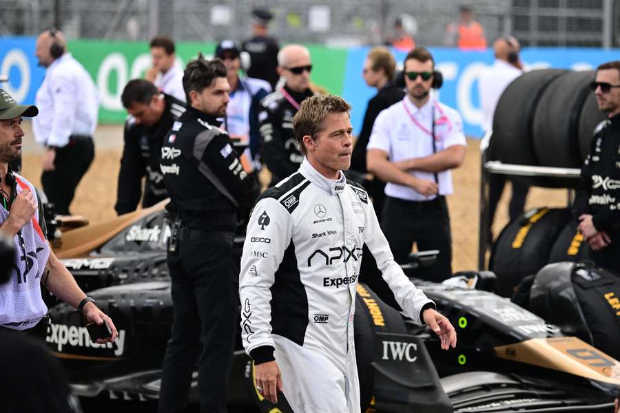 US actor Brad Pitt, starring as a driver in an F1-inspired movie, is seen prior to the Formula 1 British Grand Prix