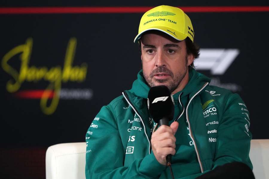 Fernando Alonso speaks to the media