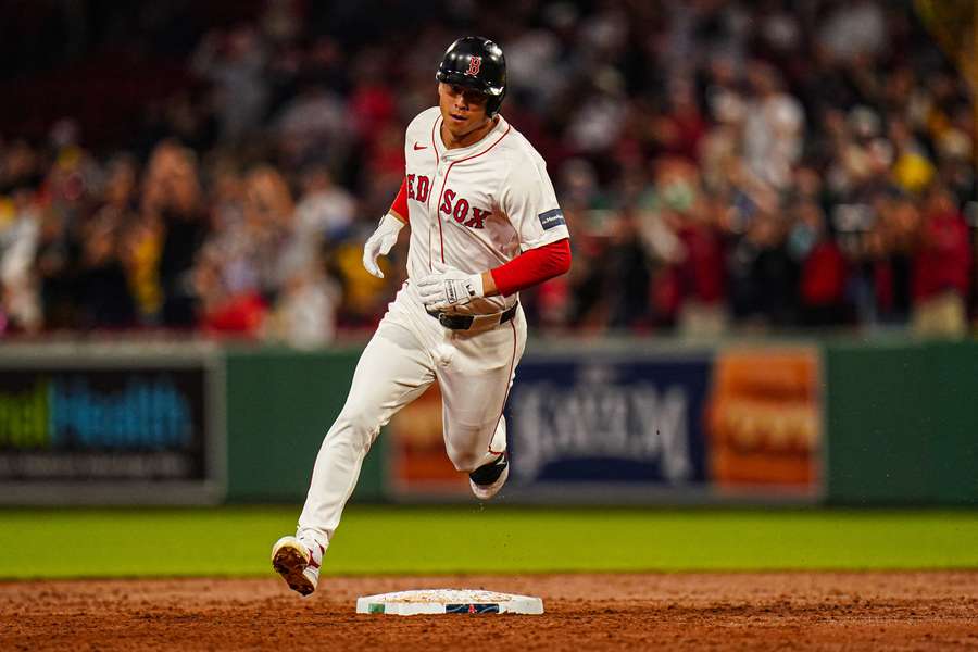 Boston Red Sox right fielder Rob Refsnyder hits a two-run home run against the Baltimore Orioles