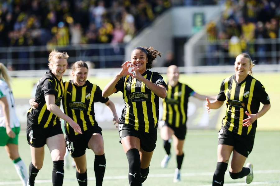 Felicia Schroder (centre) celebrates the first goal of her hat-trick