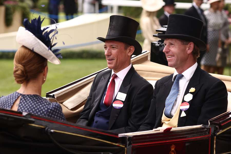 Frankie Dettori and trainer Jamie Snowden arrive in the parade ring as part of the royal procession on the final day of the Royal Ascot