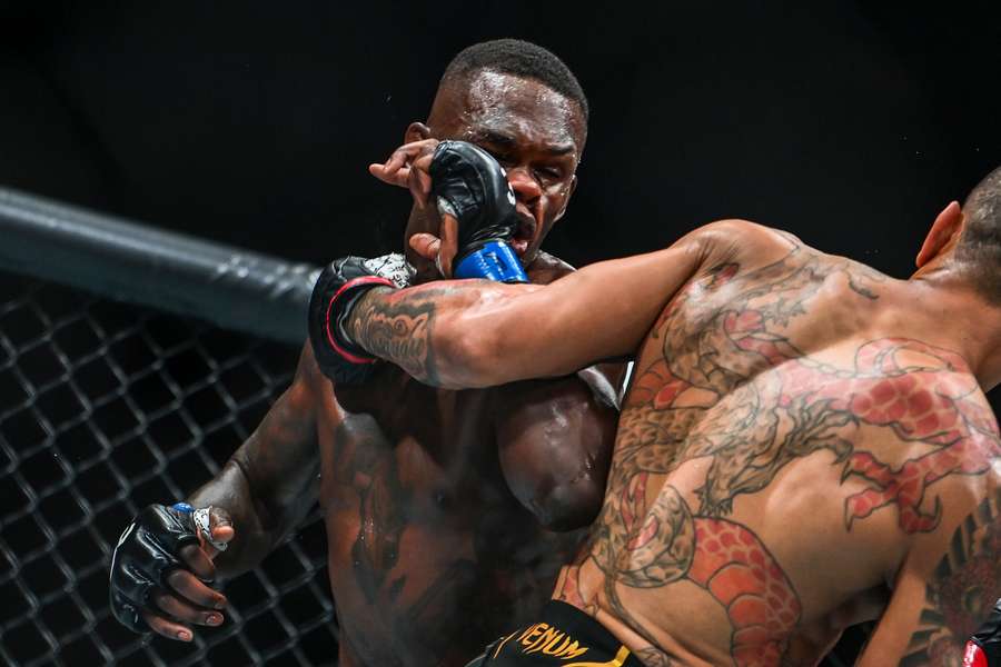 New Zealand mixed martial arts fighter Israel Adesanya fights against Brazil's Alexsandro Pereira during their UFC 287 world middleweight championship in Kaseya Center in Miami, Florida, on April 8, 2023