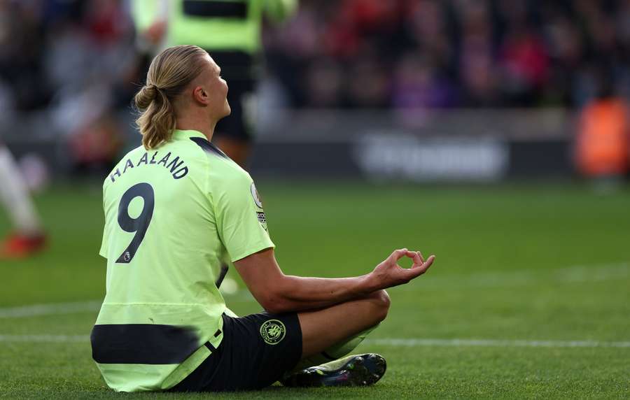 Manchester City's Norwegian striker Erling Haaland celebrates after scoring his 30th league goal of the season