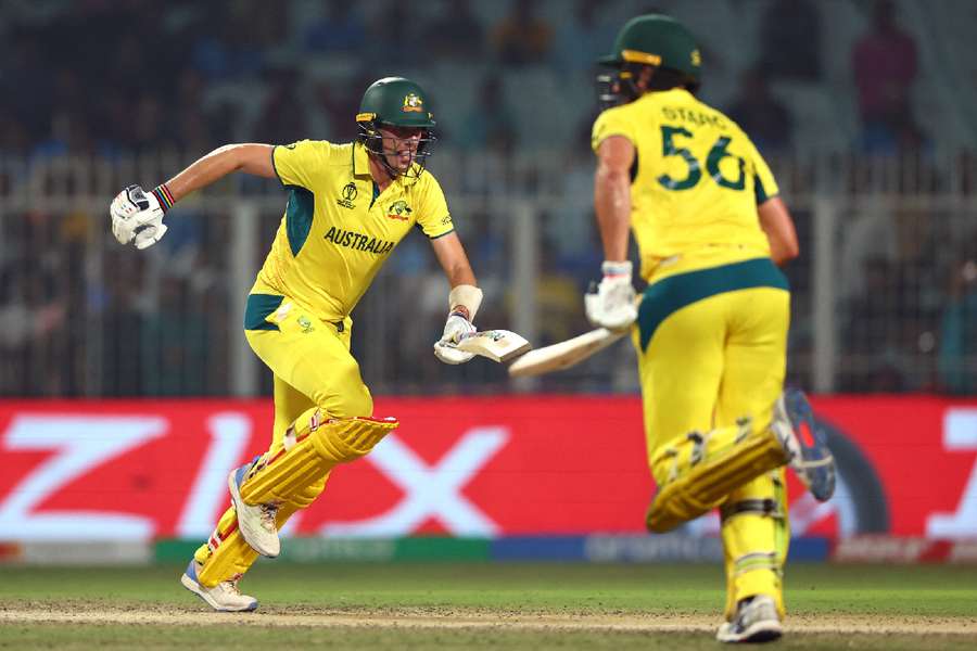 Australia's Pat Cummins and Mitchell Starc make the runs to win the match