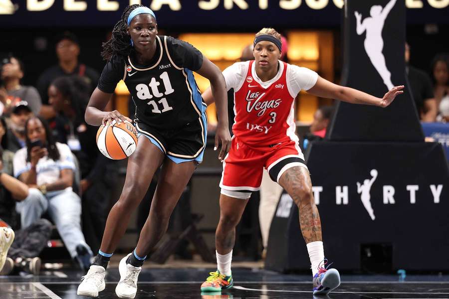 Madina Okot controls the ball against NaLyssa Smith during the 2026 WNBA season. Madina Okot controls the ball against NaLyssa Smith during the 2026 WNBA season.