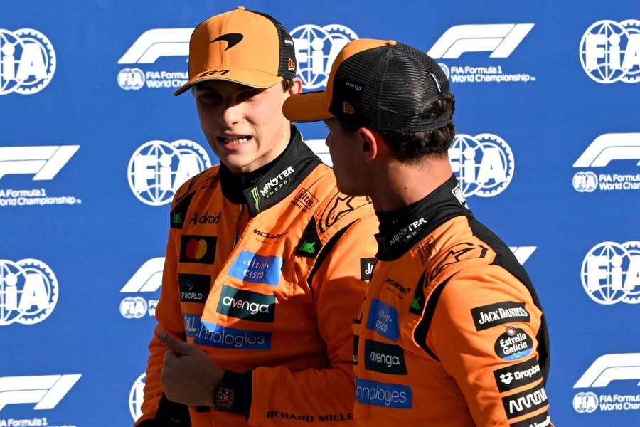 Oscar Piastri, left, and Lando Norris speak after the race