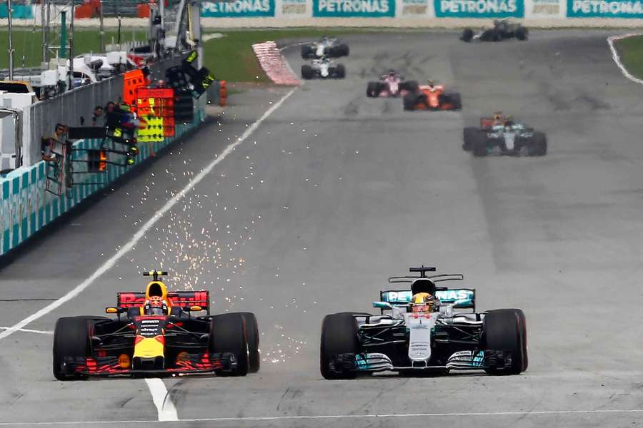 Max Verstappen, left, and Lewis Hamilton, right, battle in Malaysia in 2017